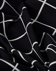 Black White Check Coating Fabric 2003 - Fabrics4Fashion