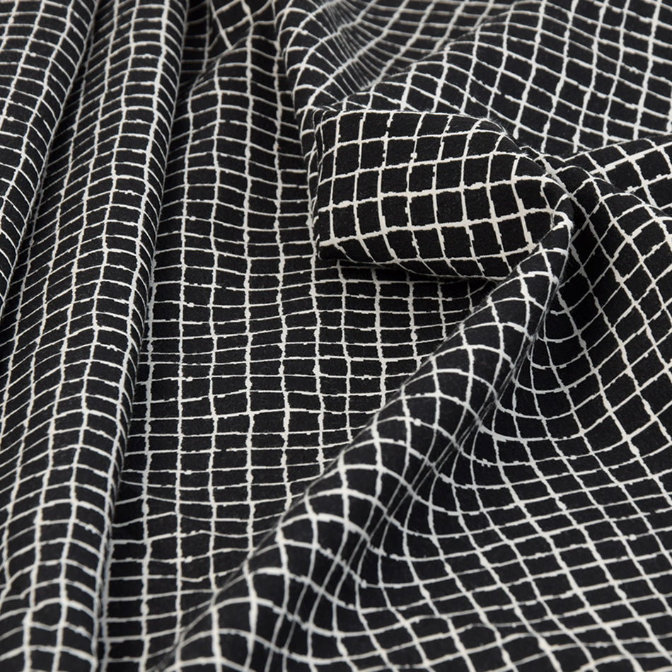 Black and White Geometric Stretch Jacquard 1978 - Fabrics4Fashion