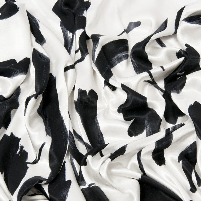 Viscose Satin Black/White Floral 48 - Fabrics4Fashion