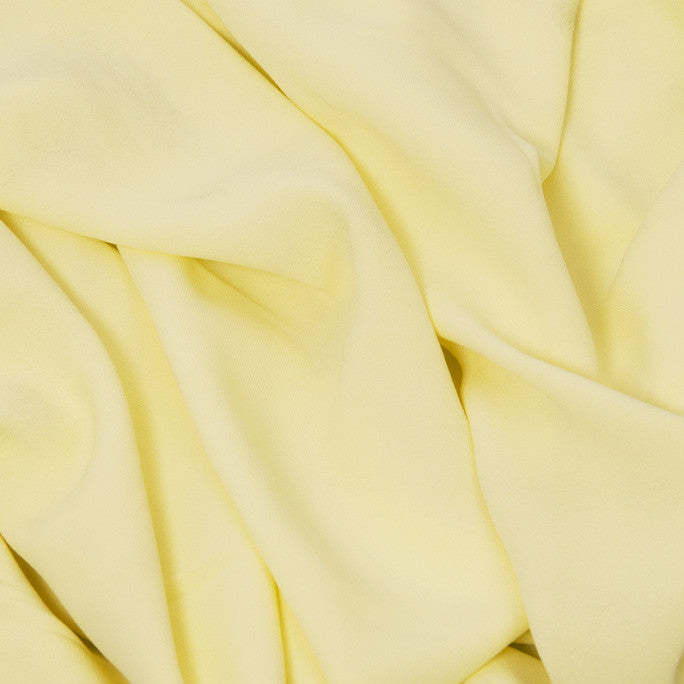 Lemon Poly Crepe 1 - Fabrics4Fashion