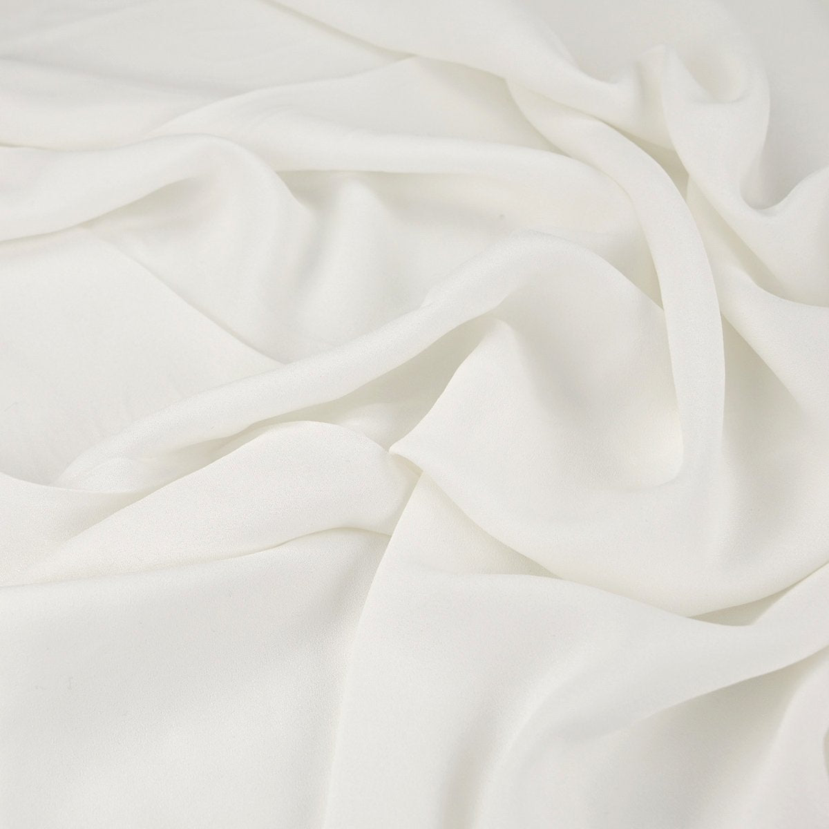 Natural White/Ivory Triple Crepe Fabric | Fabrics Galore
